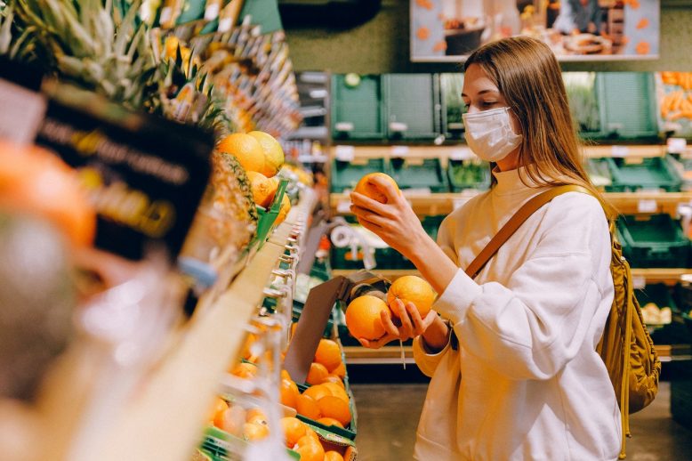woman-wearing-mask-in-supermarket-3962294 Covid 19 mask